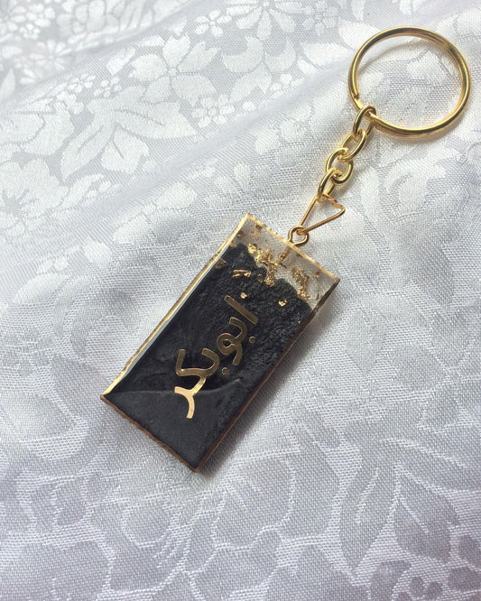 Customized Resin Keychain with Arabic Name – Black & Gold Personalized Keyring