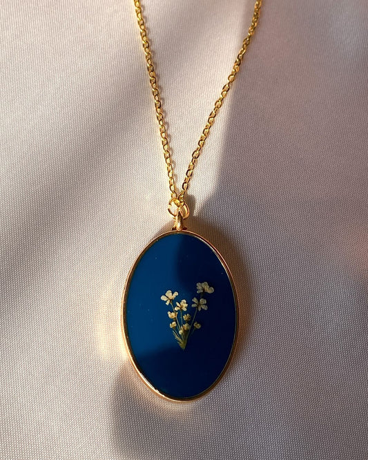 Oval Resin Necklace with Blue Background & Dried Flower Pendant
