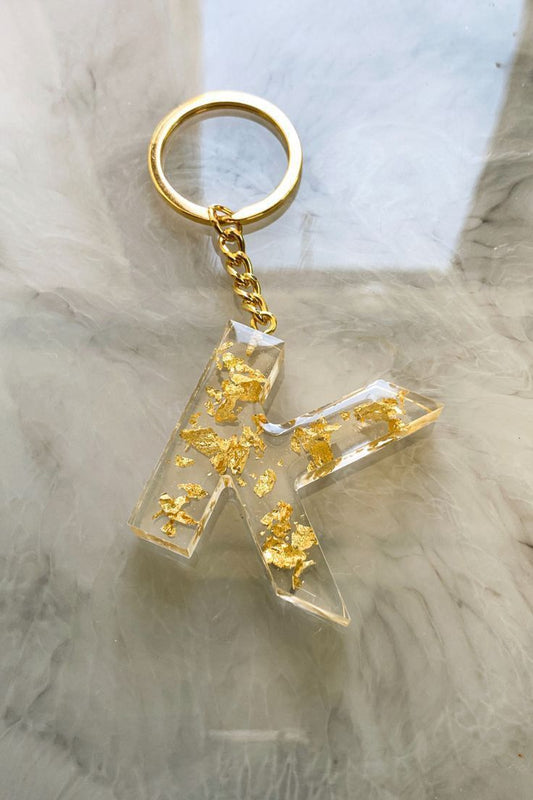 Customized Resin Alphabet Keychain "K" – Clear with Gold Foil Flakes