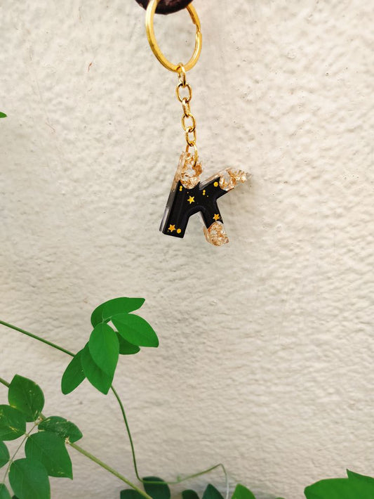 Personalized Alphabet Resin Keychain – Letter K with Gold Flakes & Stars