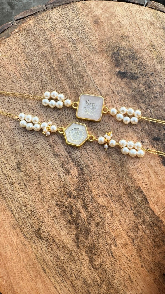Personalized Pearl Rakhi Set with Big Bro & Ganesha Charm
